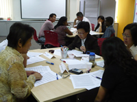 Participants from non-profit organisations engaged in a discussion.